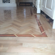 Oak herringbone with a Padauk and Maple Rope Border detail.